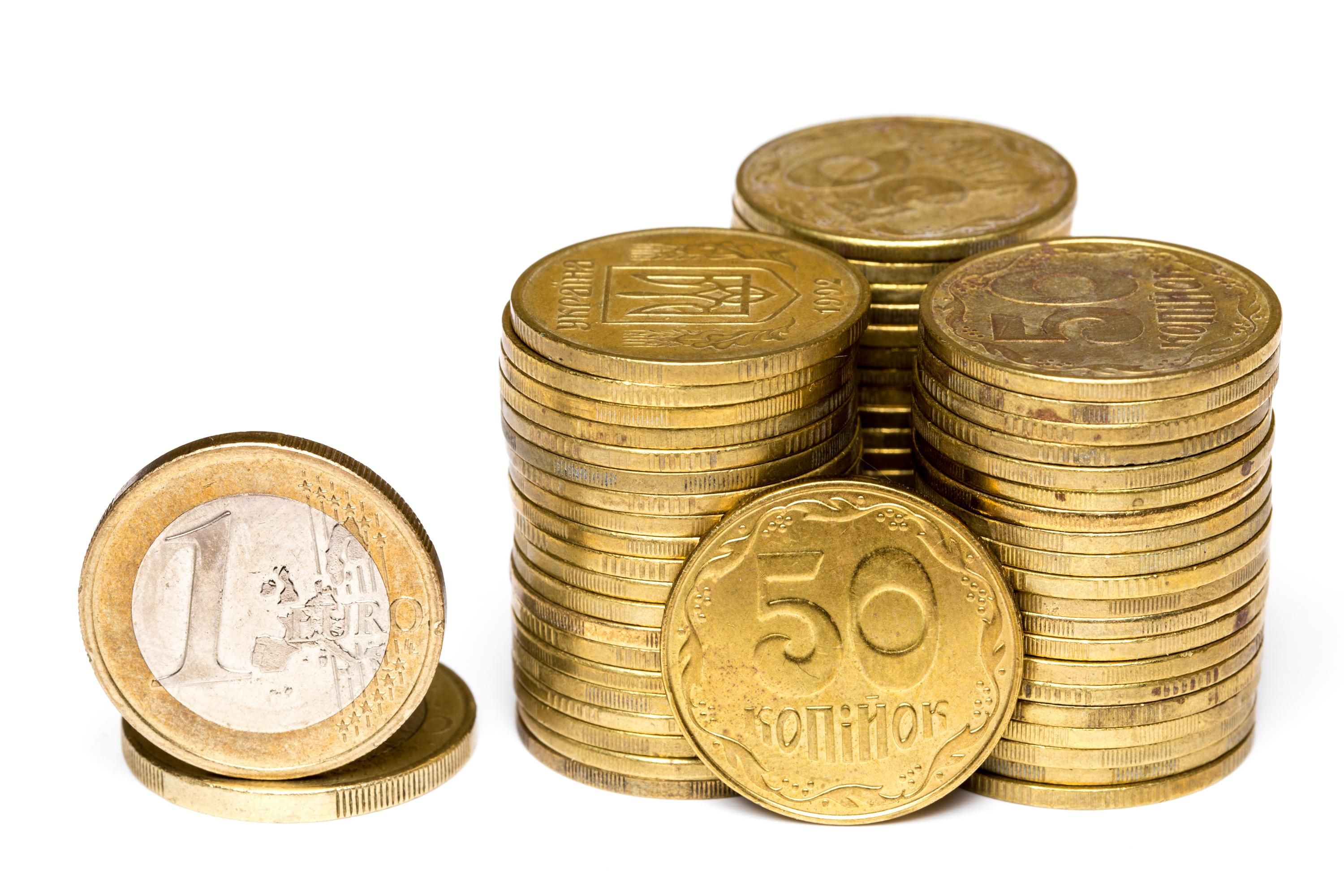 Монеты номиналом 50 копеек и 1 евроцент
